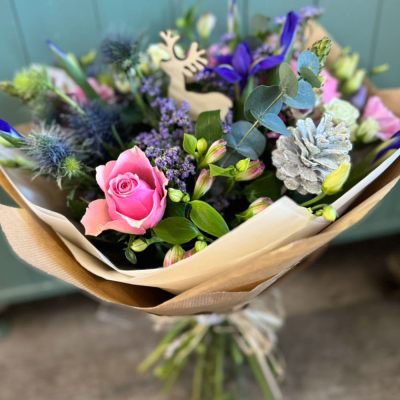 Bloom & Blush - A rich and full arrangement of blush roses, plum blooms, chrysanthemums and textured lilac fillers. A handcrafted beauty in every petal.