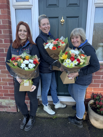 Florist choice - Handtied bouquet in water, florist choice. 
Something bright and beautiful